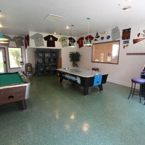 Game room with pool table, arcade and Air Hockey Table